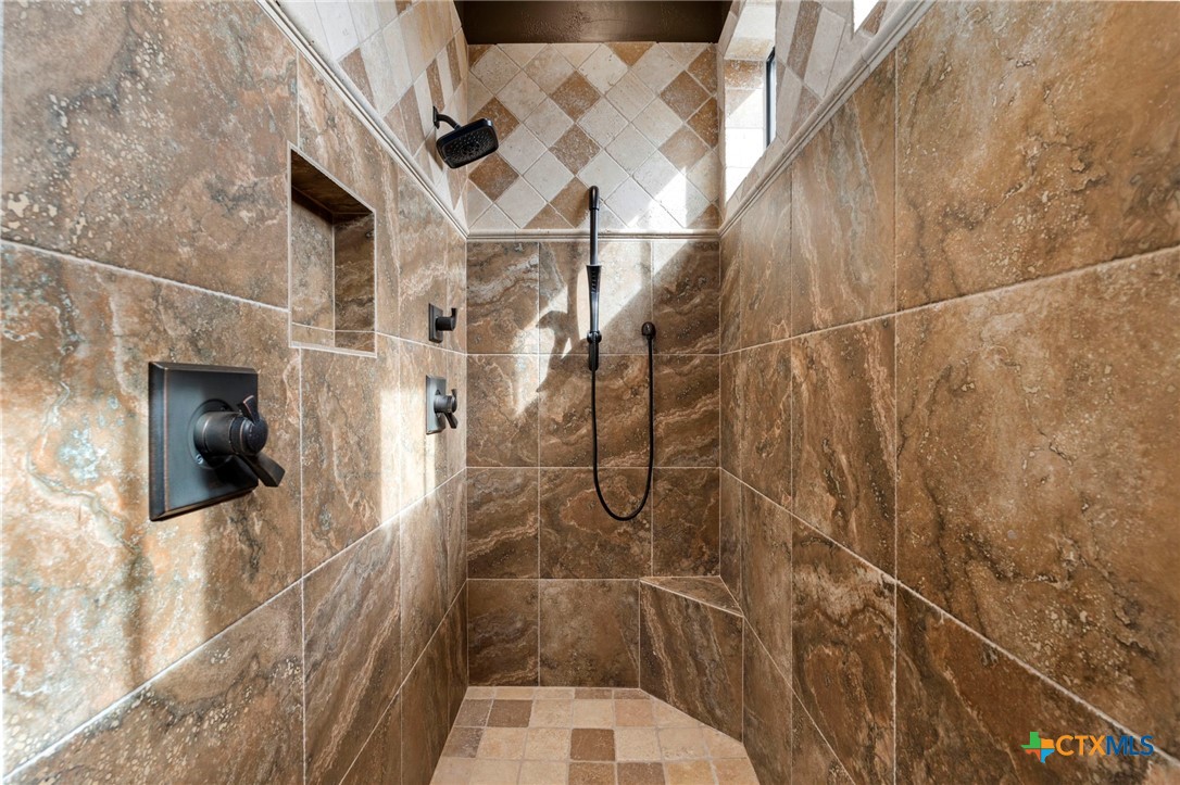 1039 Bluewater Place Spring Branch, TX 78070 - Photo 47 of 48 a bathroom with a shower