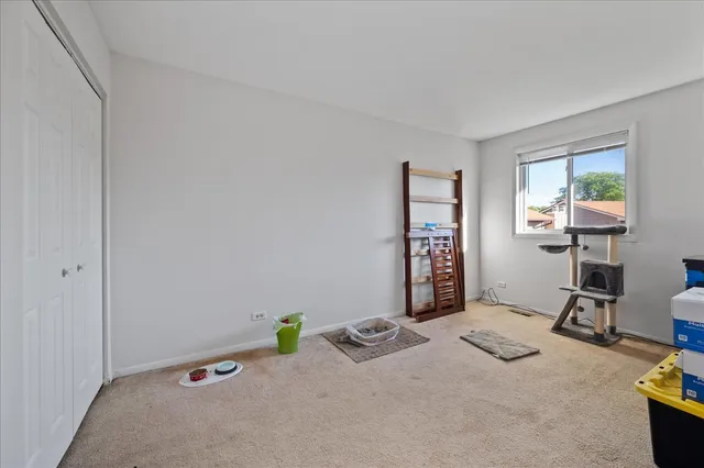 a bedroom with furniture and a fireplace