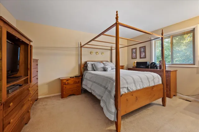 a en suite bathroom with a sink shower and a mirror
