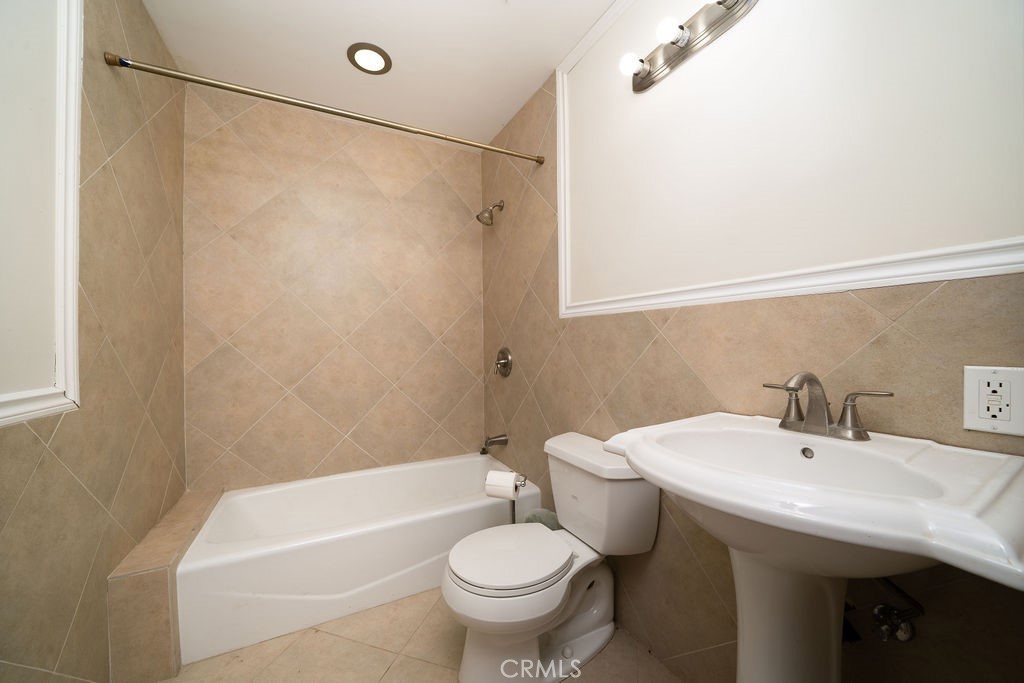8851 Sonora Road Phelan, CA 92371 - Photo 11 of 26 a bathroom with a sink a toilet and shower