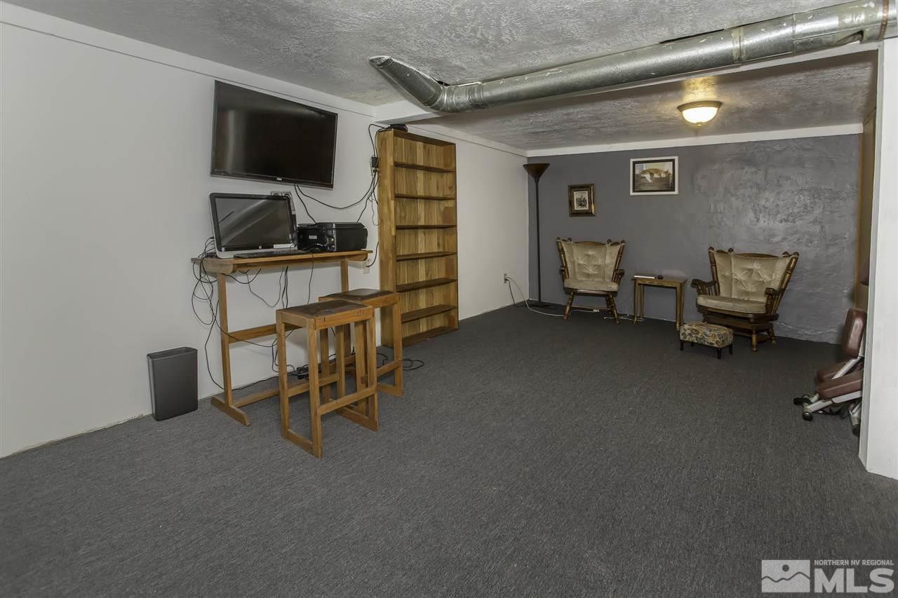 425 Roberts Street, Unit ROBERTS & 423 Reno, NV 89502 - Photo 19 of 25 a workspace with furniture and a window