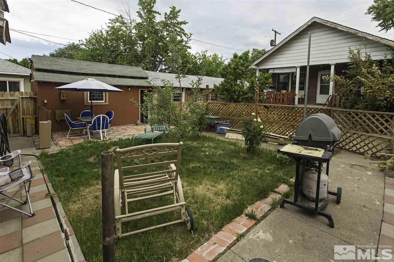 425 Roberts Street, Unit ROBERTS & 423 Reno, NV 89502 - Photo 24 of 25 a view of house with backyard outdoor seating area