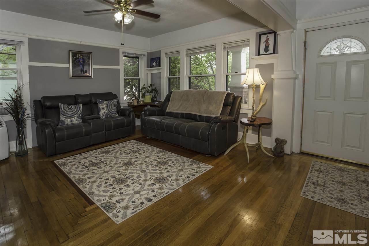 425 Roberts Street, Unit ROBERTS & 423 Reno, NV 89502 - Photo 3 of 25 a living room with furniture and a rug