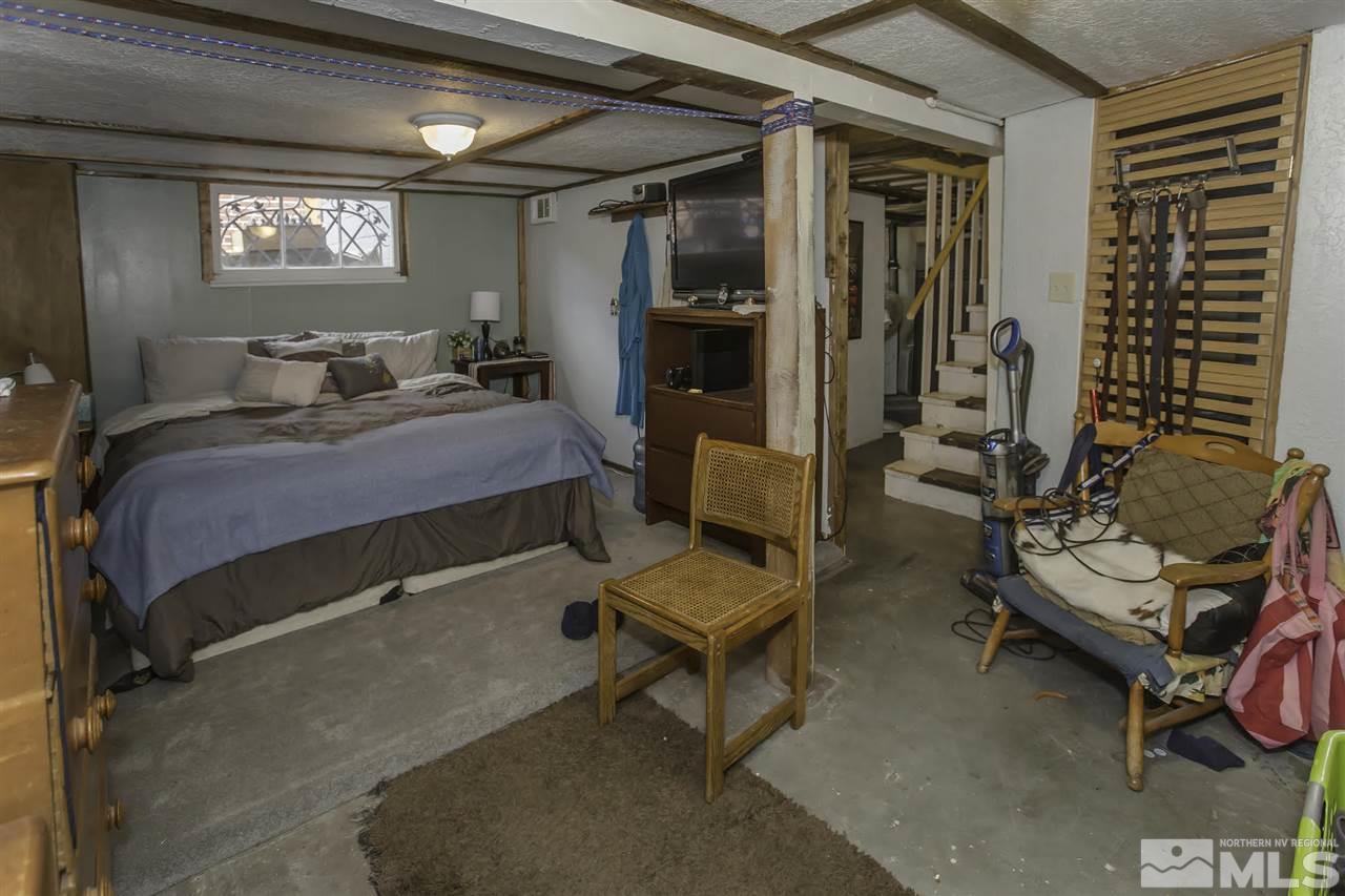 425 Roberts Street, Unit ROBERTS & 423 Reno, NV 89502 - Photo 9 of 25 a bedroom with furniture and a window