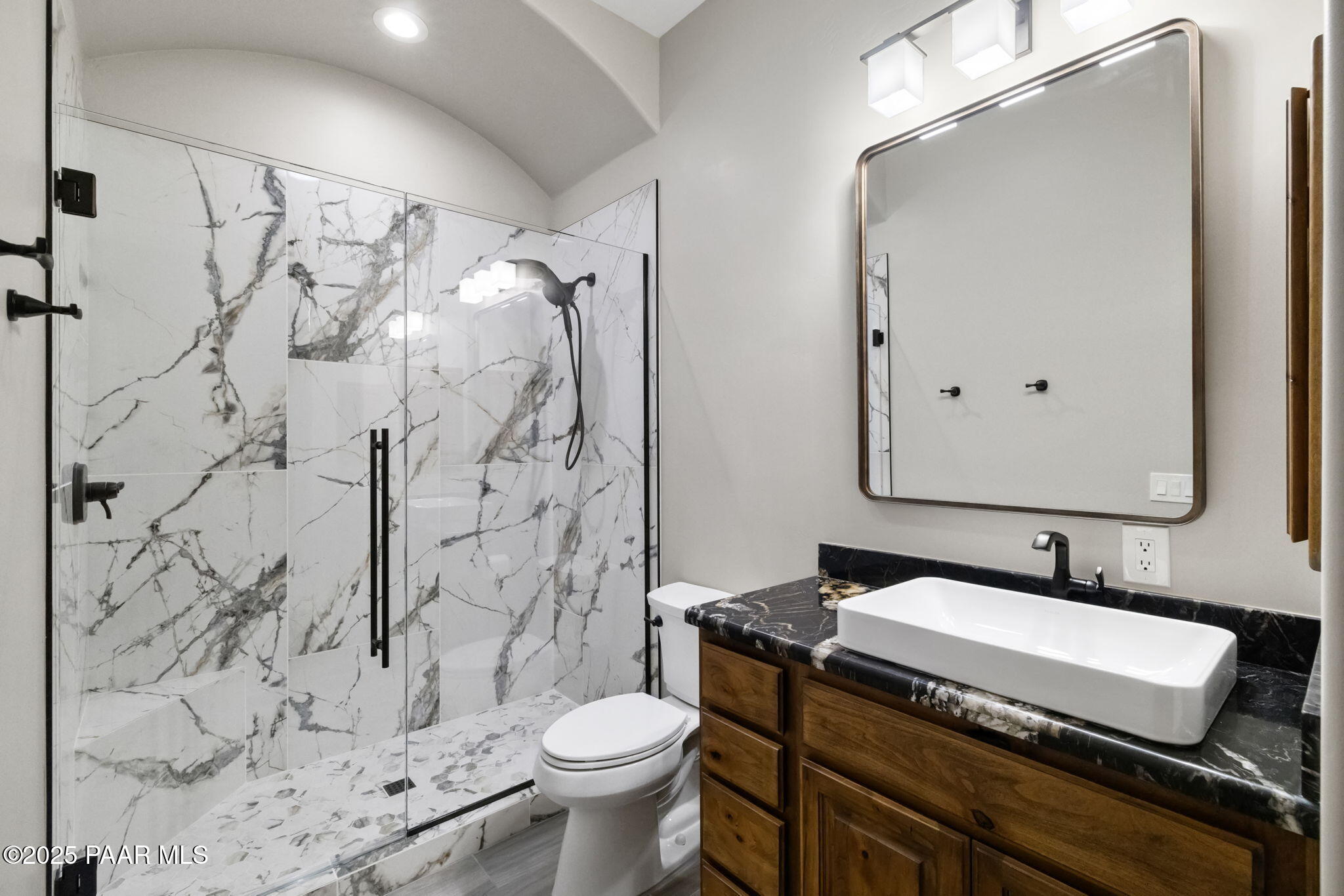 4140 Chuckwalla Road Prescott, AZ 86305 - Photo 49 of 82 a bathroom with a granite countertop sink toilet and shower