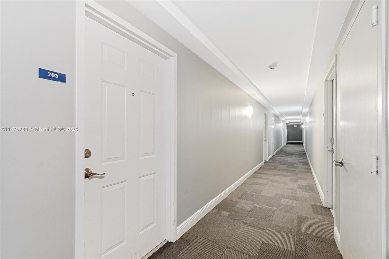 3000 Coral Way, Unit 703 Miami, FL 33145 - Photo 9 of 26 a view of a hallway