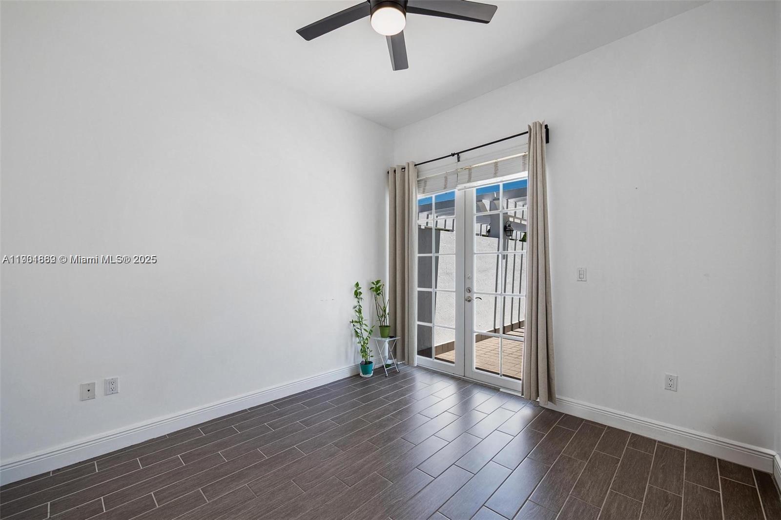 7765 Southwest 54th Court, Unit 7765 Miami, FL 33143 - Photo 15 of 30 wooden floor in an empty room