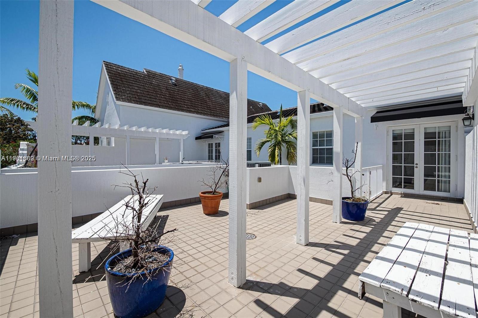 7765 Southwest 54th Court, Unit 7765 Miami, FL 33143 - Photo 20 of 30 a outdoor space with furniture