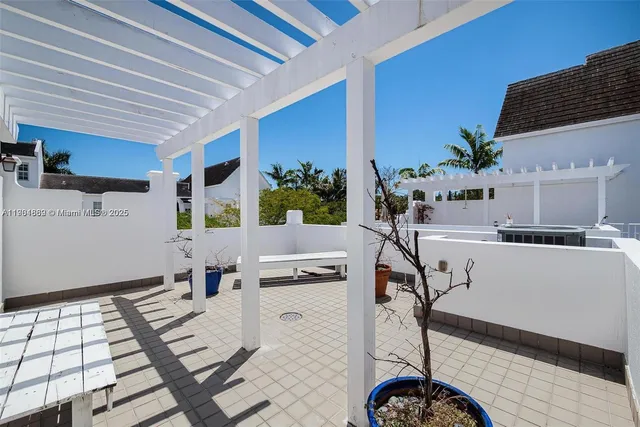 a view of kitchen with furniture and window