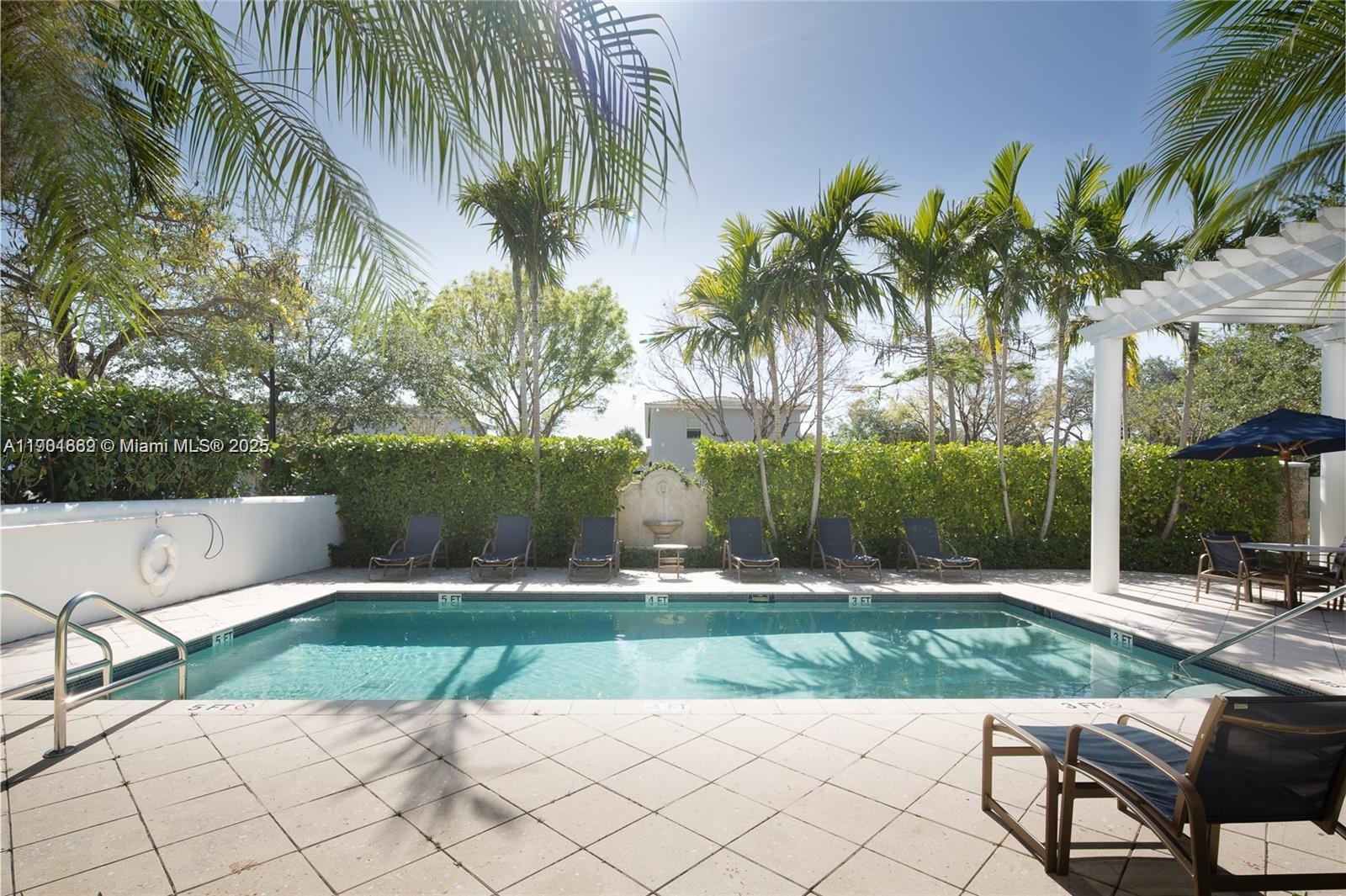 7765 Southwest 54th Court, Unit 7765 Miami, FL 33143 - Photo 23 of 30 a view of a park with palm trees