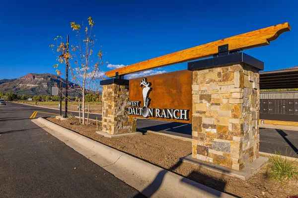 a view of a street with a building in the background