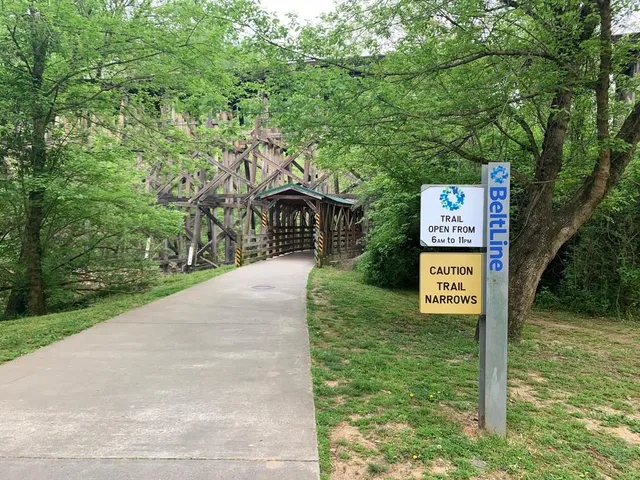 a sign that is on the side of a road