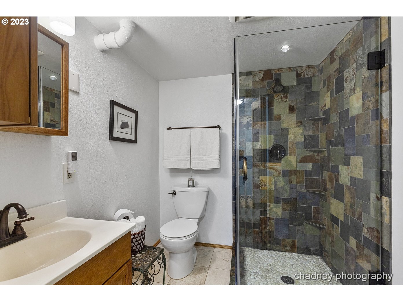 2847 Northeast Brower Road Corbett, OR 97019 - Photo 23 of 48 a bathroom with a sink toilet and shower