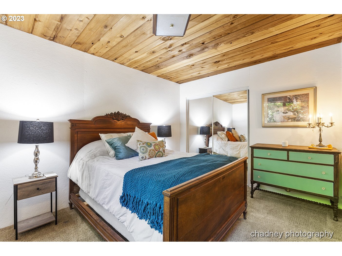 2847 Northeast Brower Road Corbett, OR 97019 - Photo 24 of 48 a bedroom with a bed and a mirror