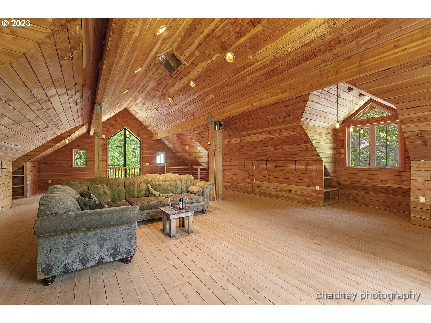 2847 Northeast Brower Road Corbett, OR 97019 - Photo 35 of 48 a living room with furniture a fireplace and a large window