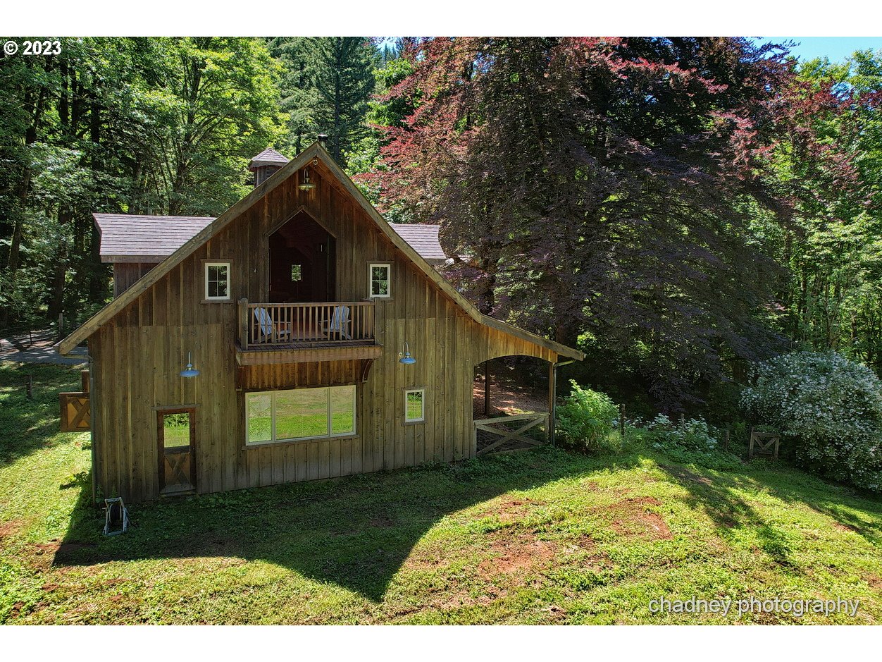 2847 Northeast Brower Road Corbett, OR 97019 - Photo 38 of 48 a view of a tiny house with a small yard