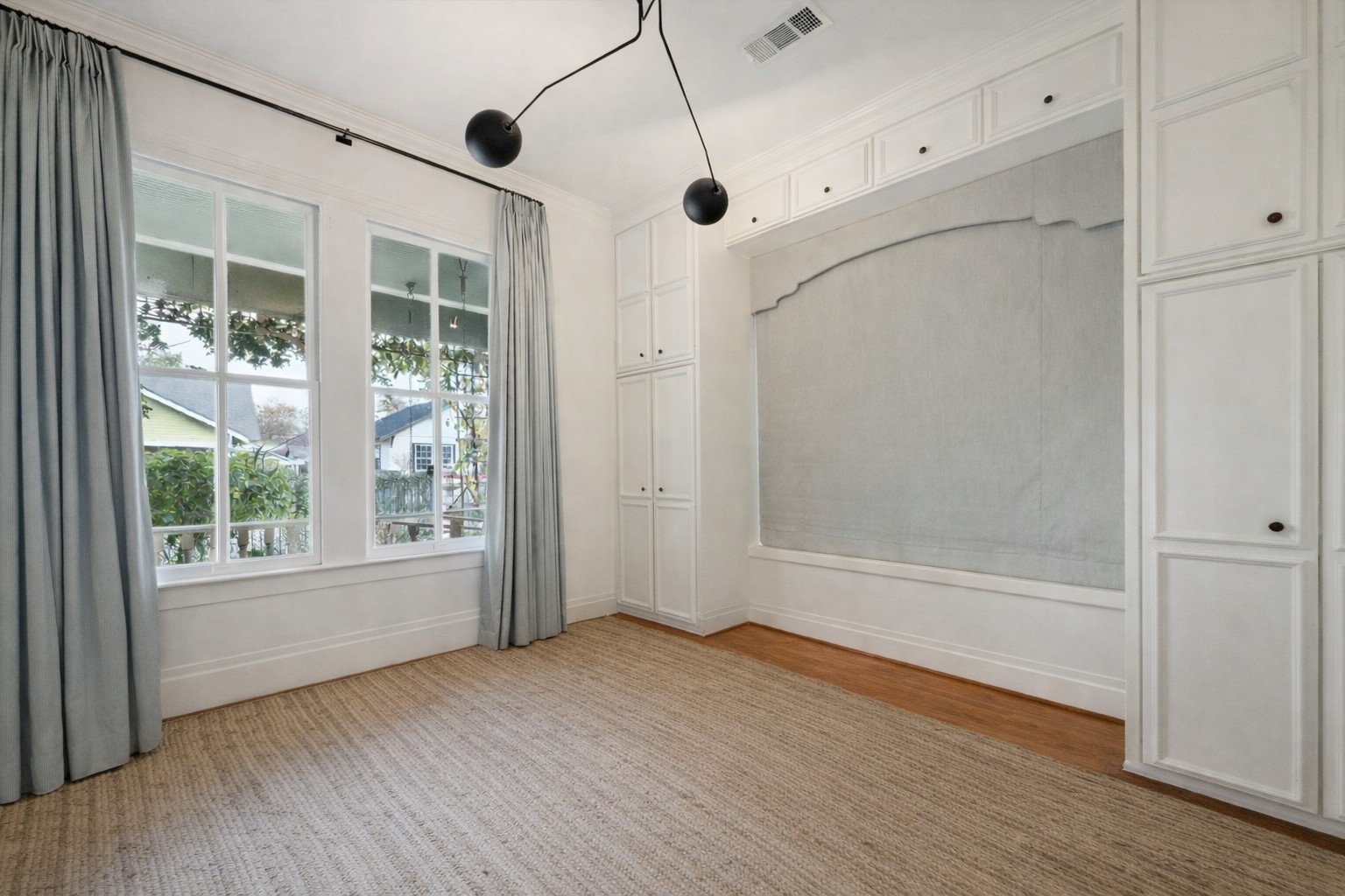 307 Archer Street Houston, TX 77009 - Photo 17 of 26 a view of empty room with wooden floor and fan