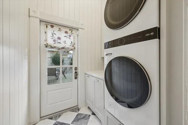 a close view of a utility room with dryer and washer