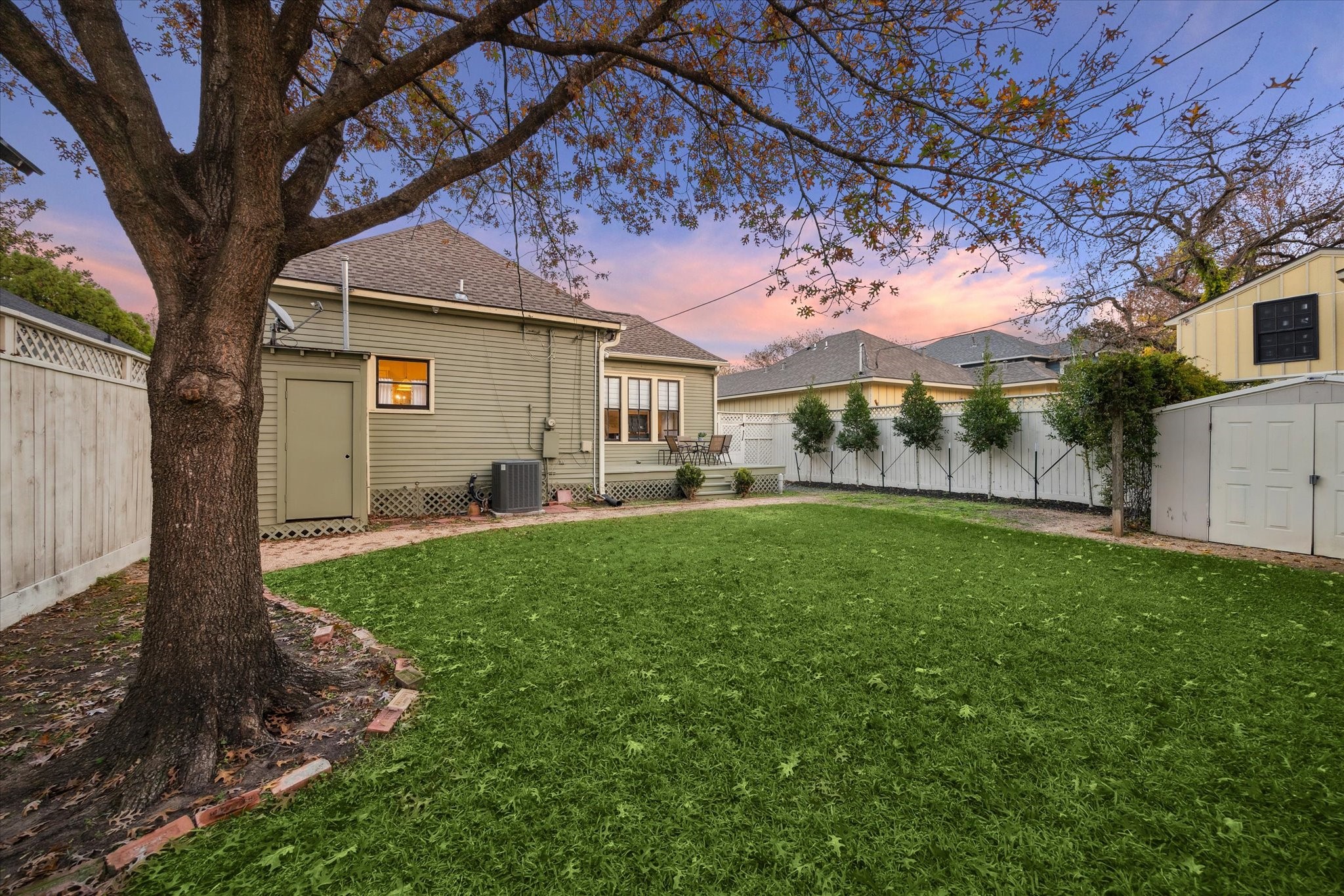 307 Archer Street Houston, TX 77009 - Photo 22 of 26 a view of a house with a backyard