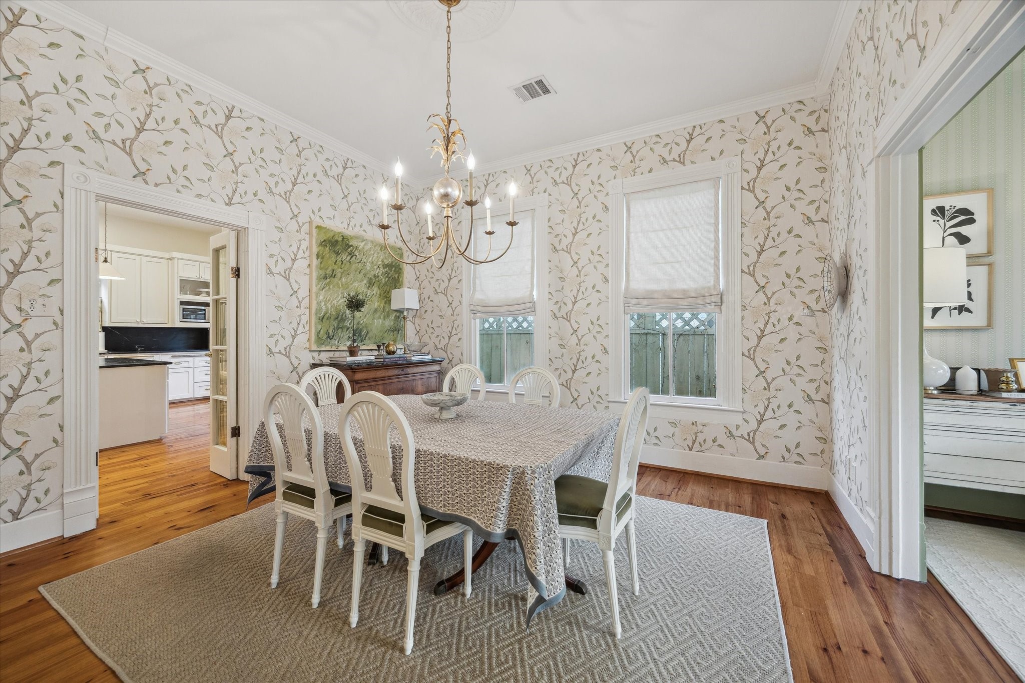 307 Archer Street Houston, TX 77009 - Photo 6 of 26 a view of a dining room with furniture and wooden floor