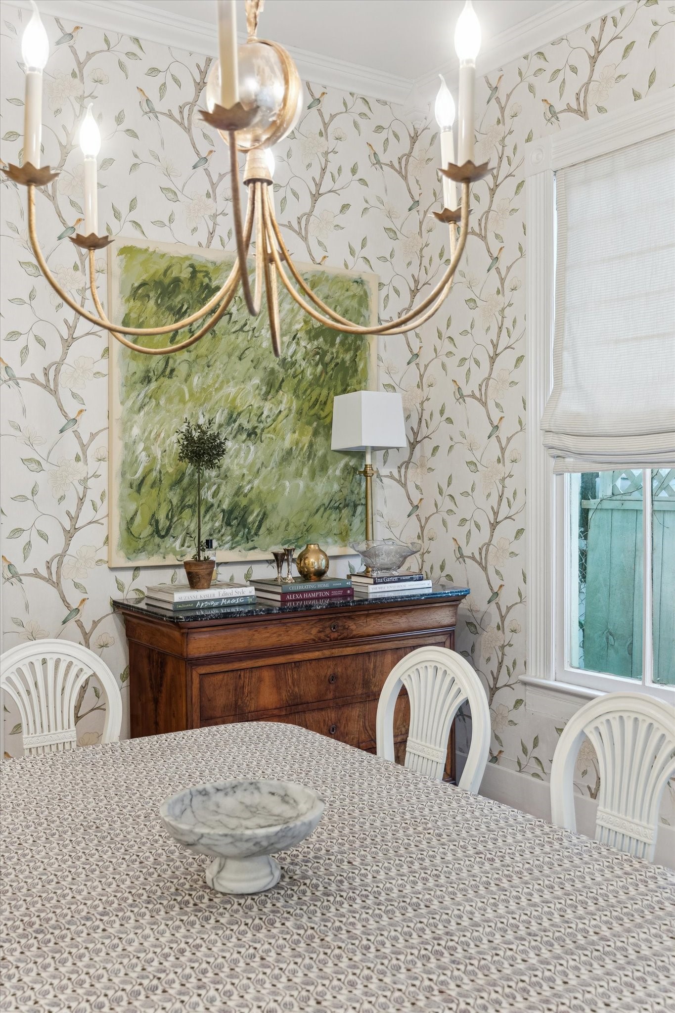 307 Archer Street Houston, TX 77009 - Photo 9 of 26 a living room with a couch and a chandelier
