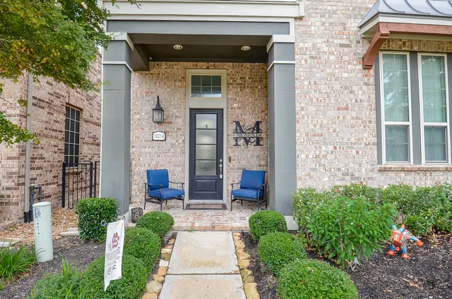 a front view of a house with a porch
