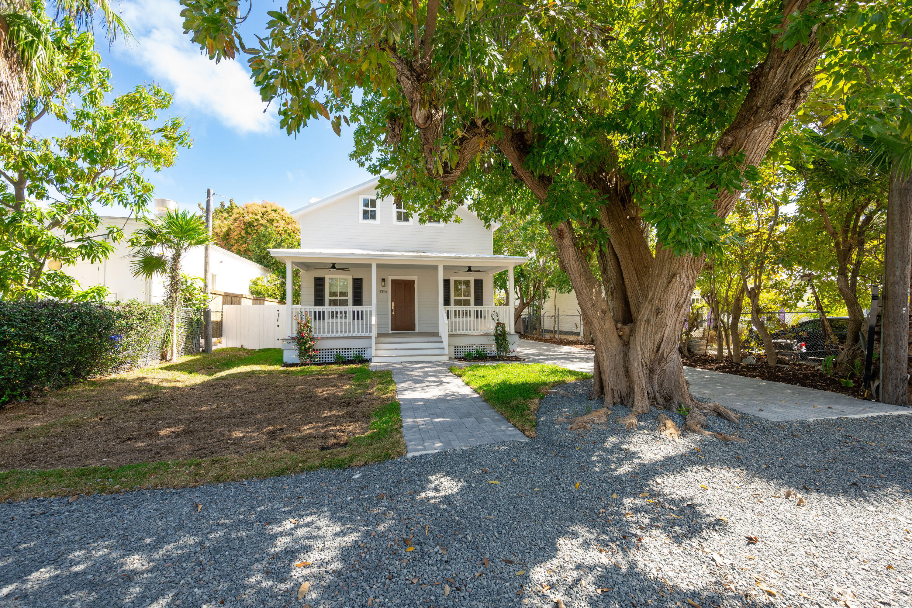 1315 William Street Key West, FL 33040 - Photo 16 of 26 a front view of a house with a yard