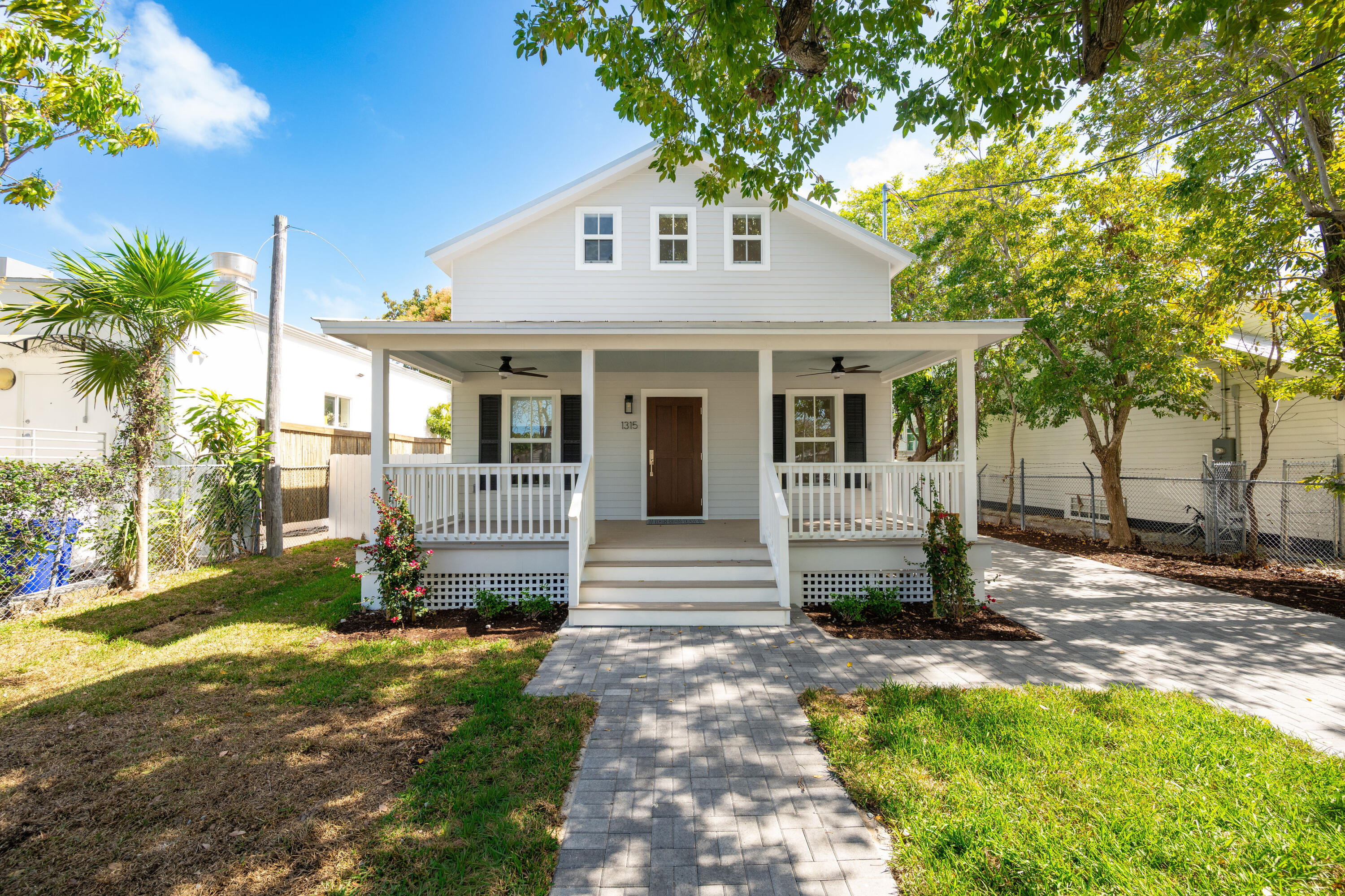 1315 William Street Key West, FL 33040 - Photo 19 of 26 a front view of a house with a porch