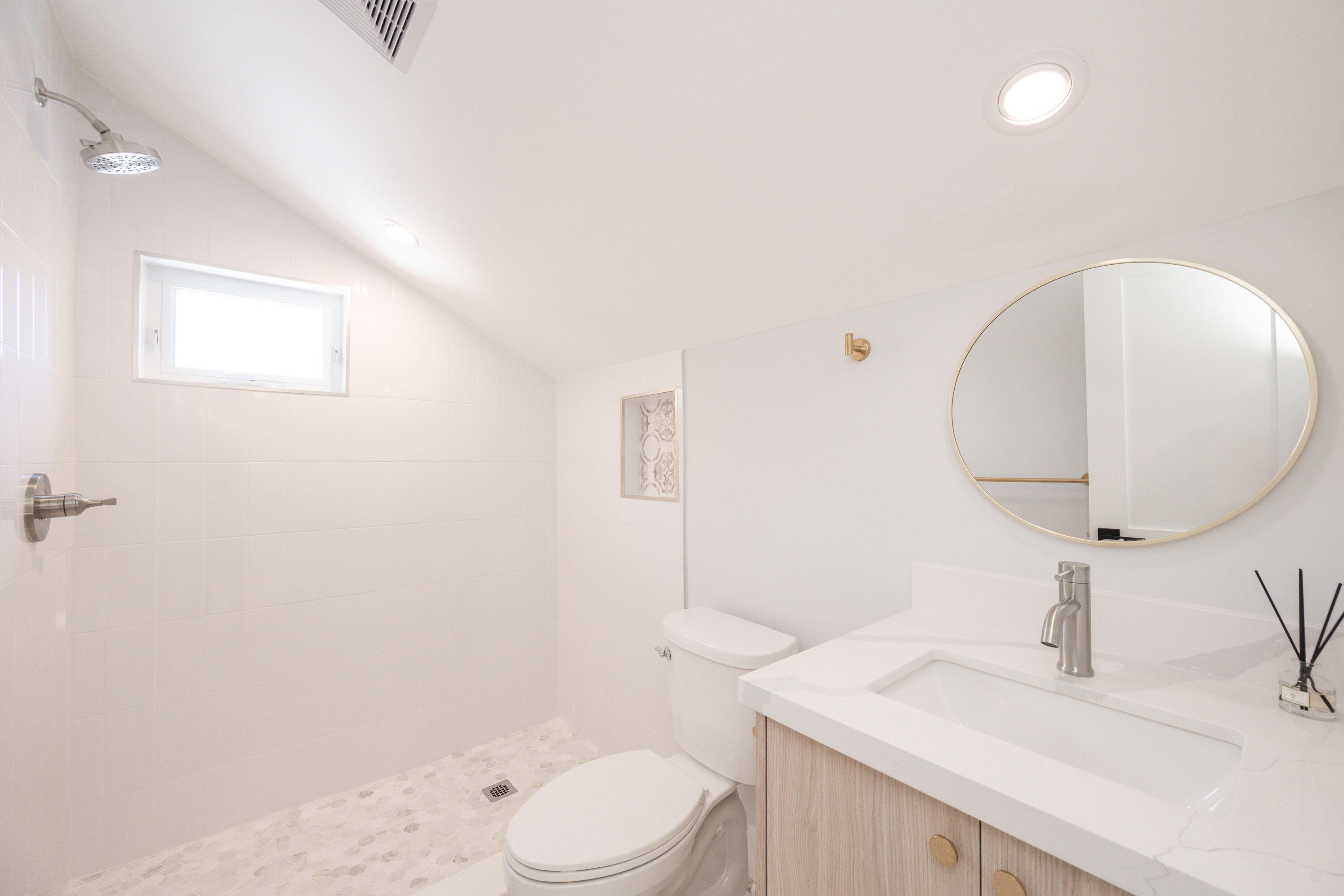 1315 William Street Key West, FL 33040 - Photo 26 of 26 a bathroom with a sink a toilet and a mirror