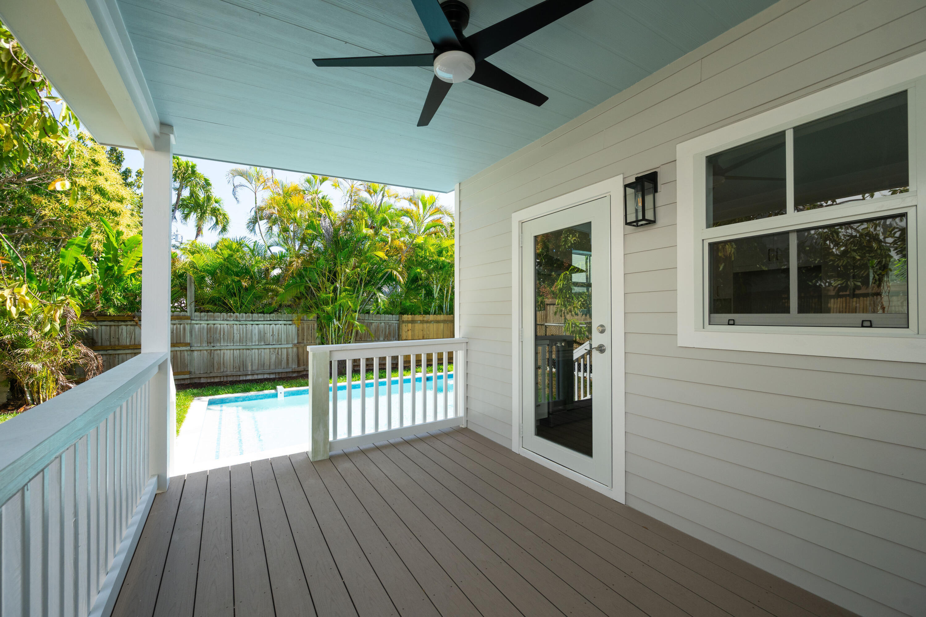 1315 William Street Key West, FL 33040 - Photo 6 of 26 a view of a porch with wooden floor and outdoor space