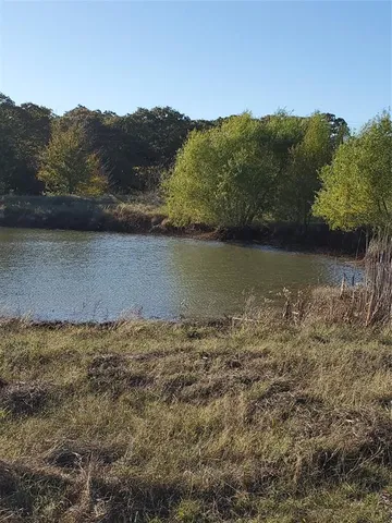 a view of a lake view with mountain