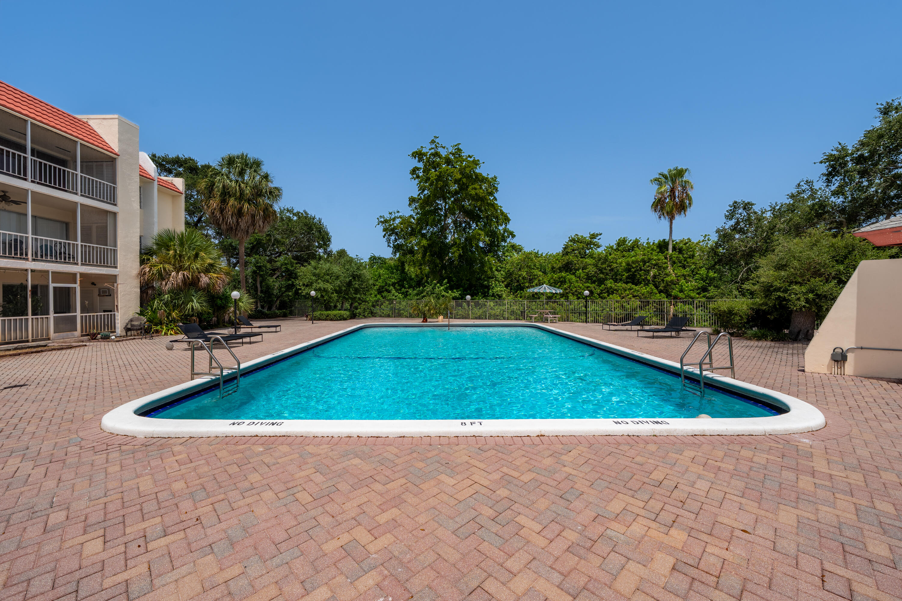 628 Northwest 13th Street, Unit 11 Boca Raton, FL 33486 - Photo 20 of 22 a view of outdoor space pool patio and yard