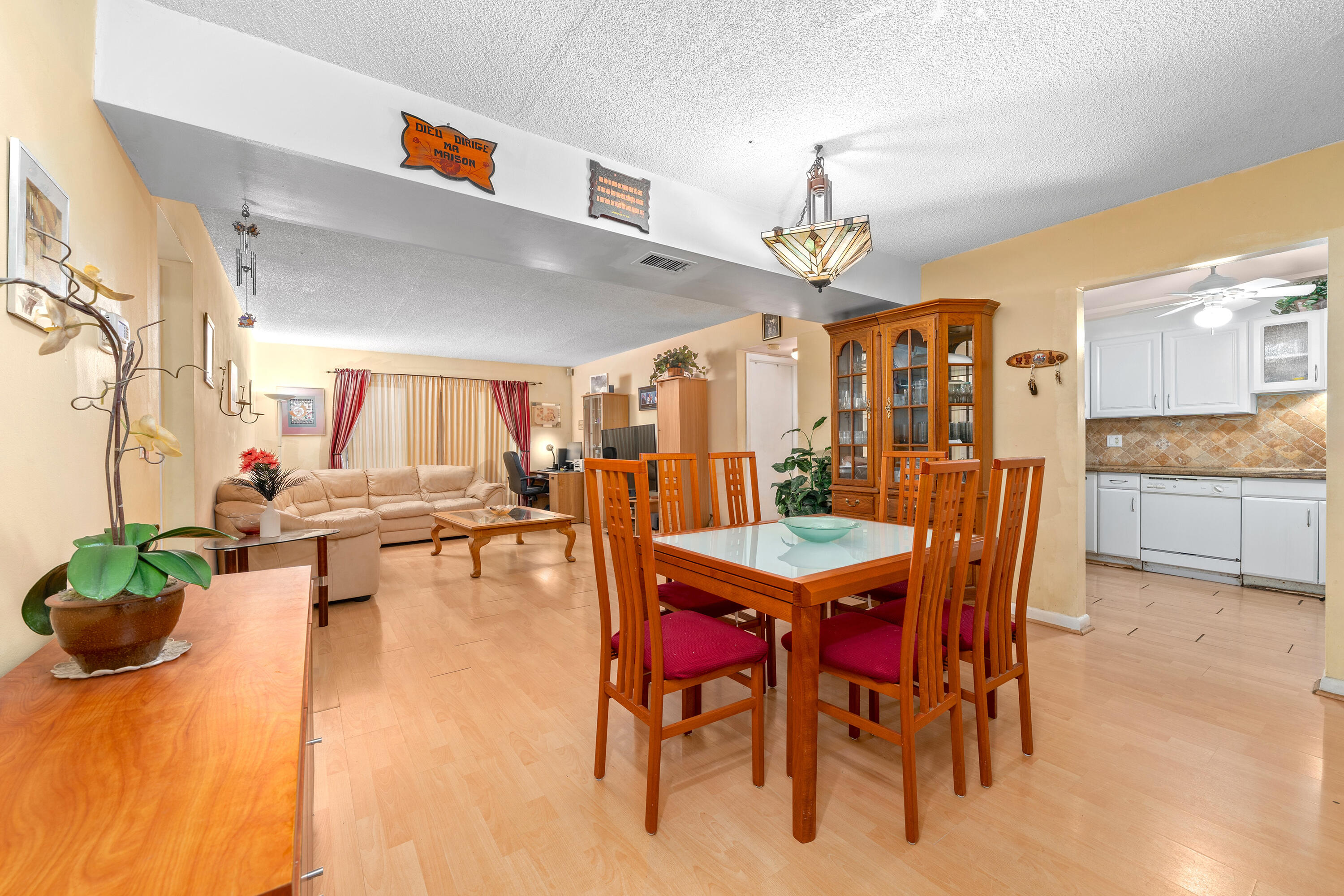 628 Northwest 13th Street, Unit 11 Boca Raton, FL 33486 - Photo 6 of 22 a very nice looking dining room with a table and chairs