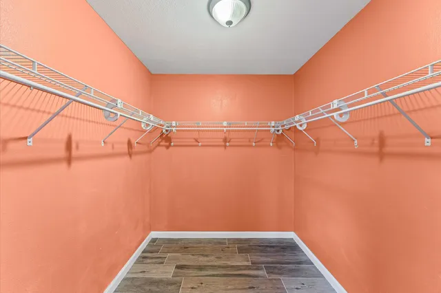 a view of a room with racks on the wall