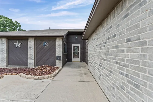 a view of entrance gate of a house