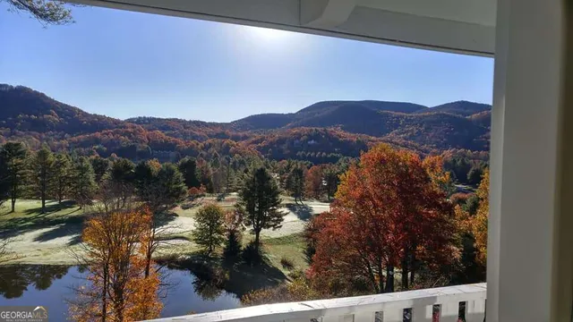 a view of a house with a mountain