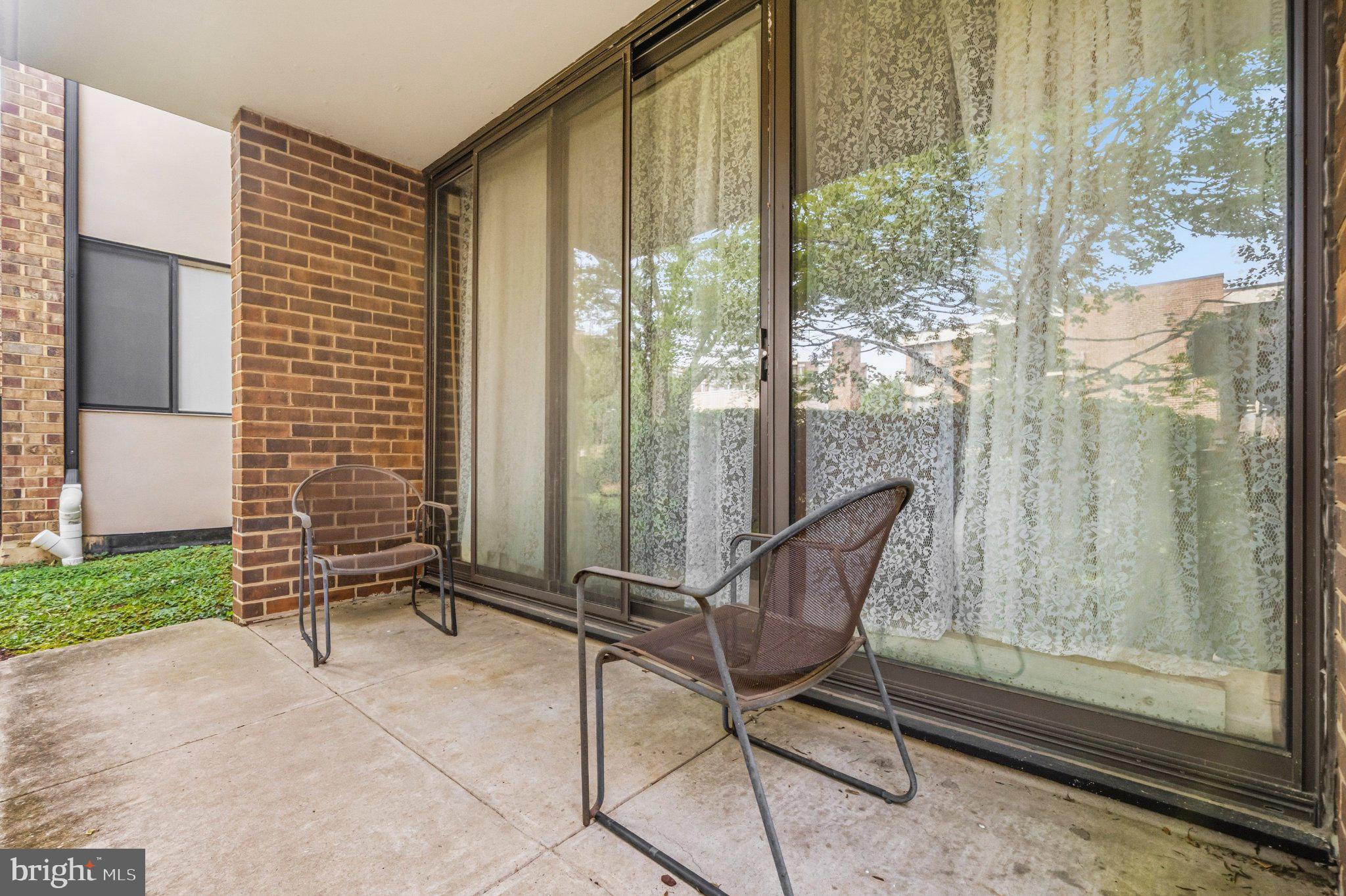 2103 Walsh View Terrace, Unit 102 Silver Spring, MD 20902 - Photo 27 of 30 Charming patio retreat awaits you.
