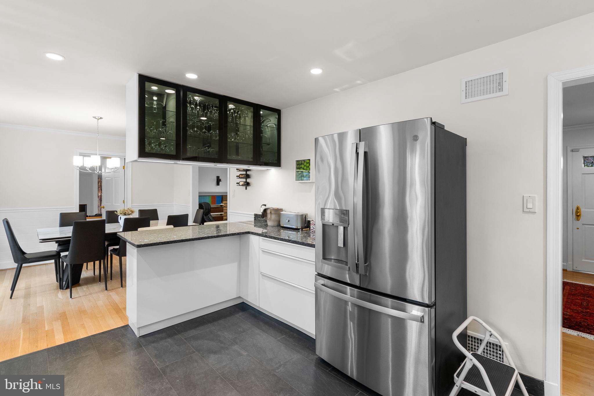 4111 Clagett Road Hyattsville, MD 20782 - Photo 15 of 61 a kitchen with stainless steel appliances a refrigerator sink and microwave