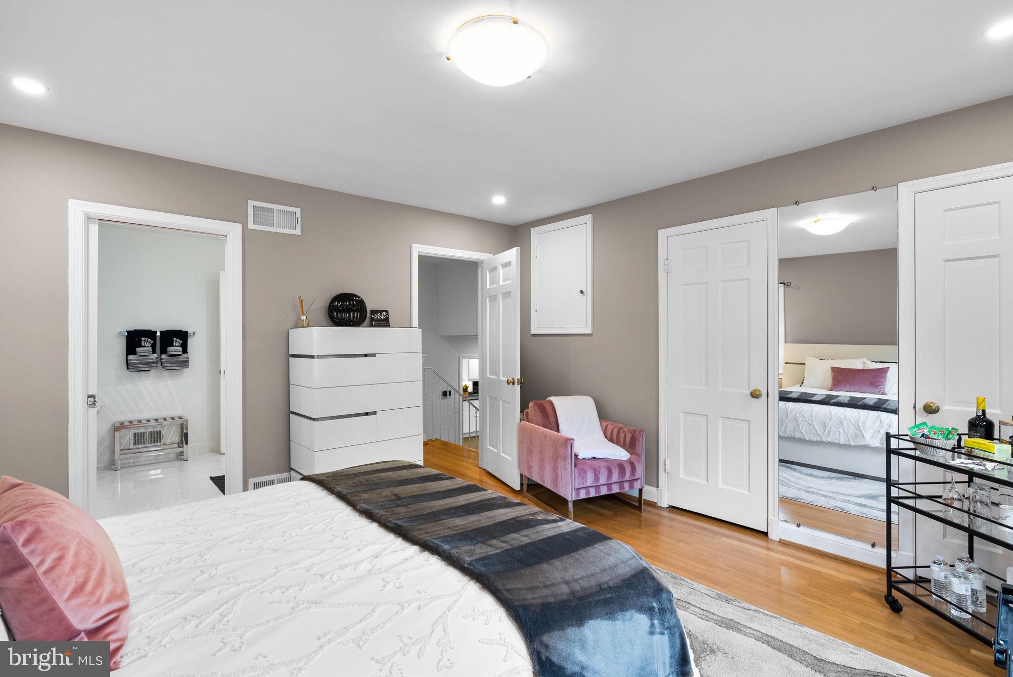 4111 Clagett Road Hyattsville, MD 20782 - Photo 18 of 61 a bedroom with a bed and furniture