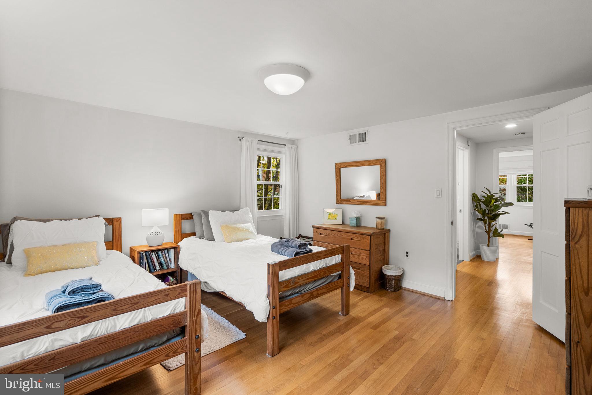 4111 Clagett Road Hyattsville, MD 20782 - Photo 26 of 61 a bedroom with furniture and a wooden floor