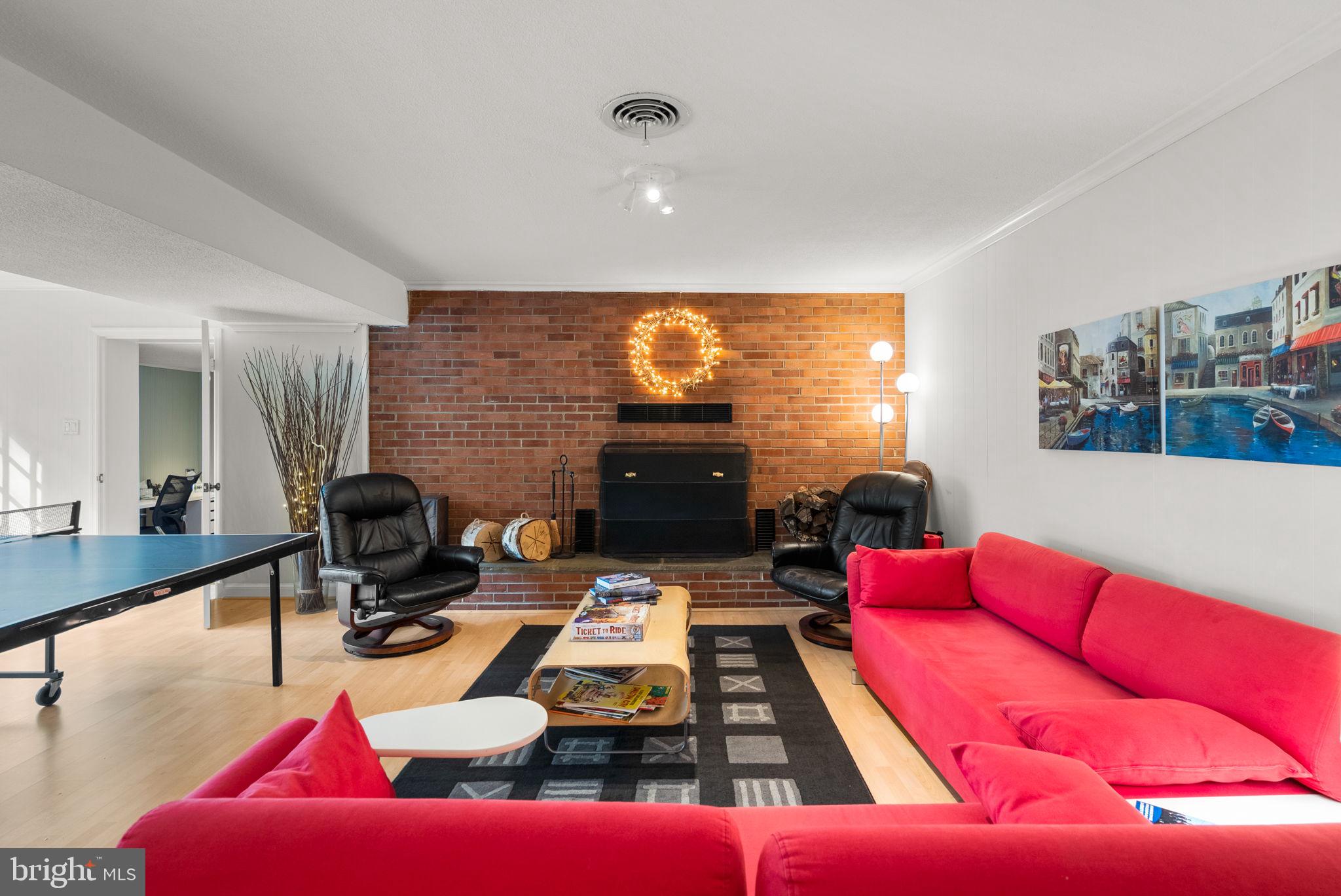 4111 Clagett Road Hyattsville, MD 20782 - Photo 31 of 61 Wall-to-Wall Brick Surround FP