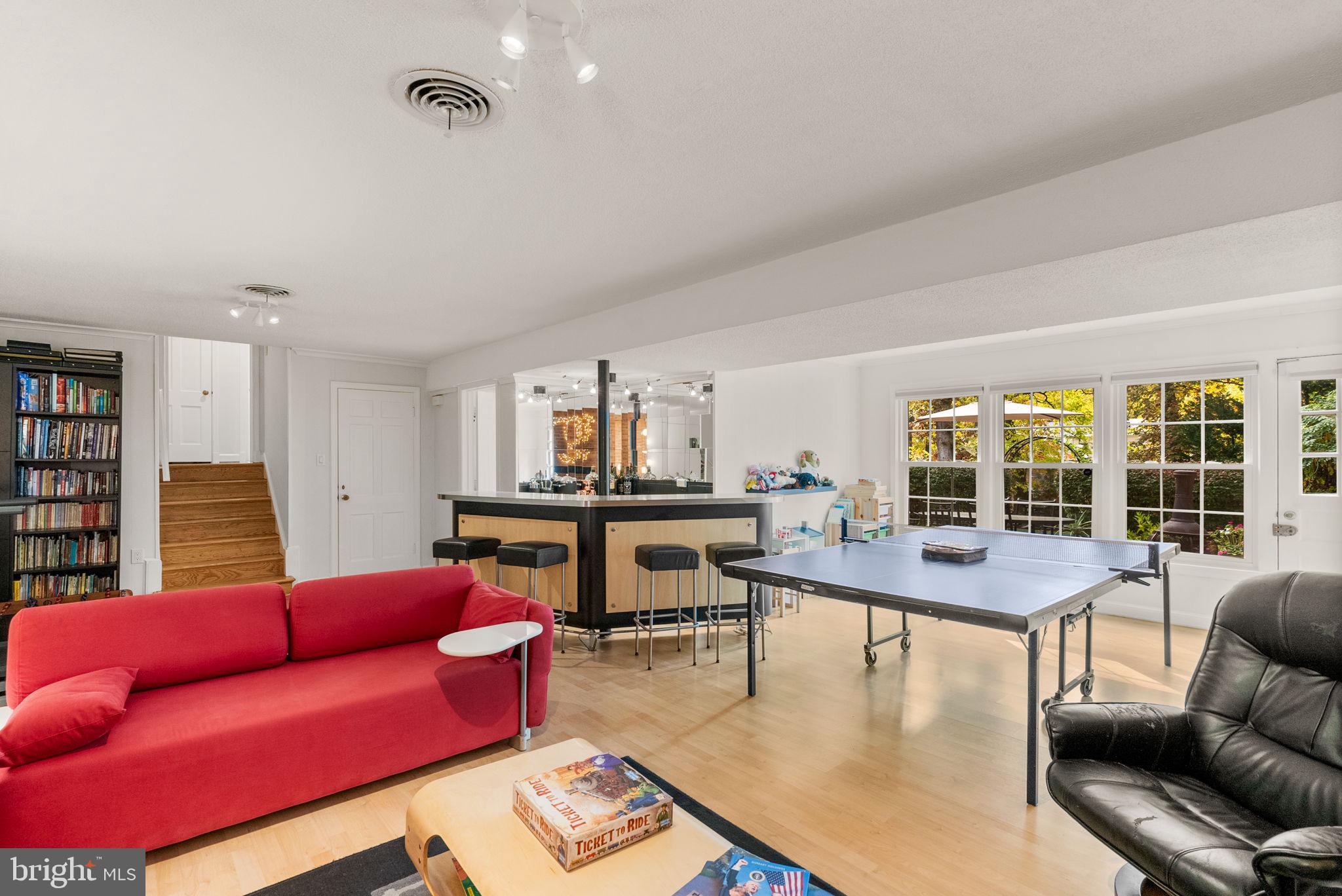 4111 Clagett Road Hyattsville, MD 20782 - Photo 33 of 61 a living room with furniture and a table