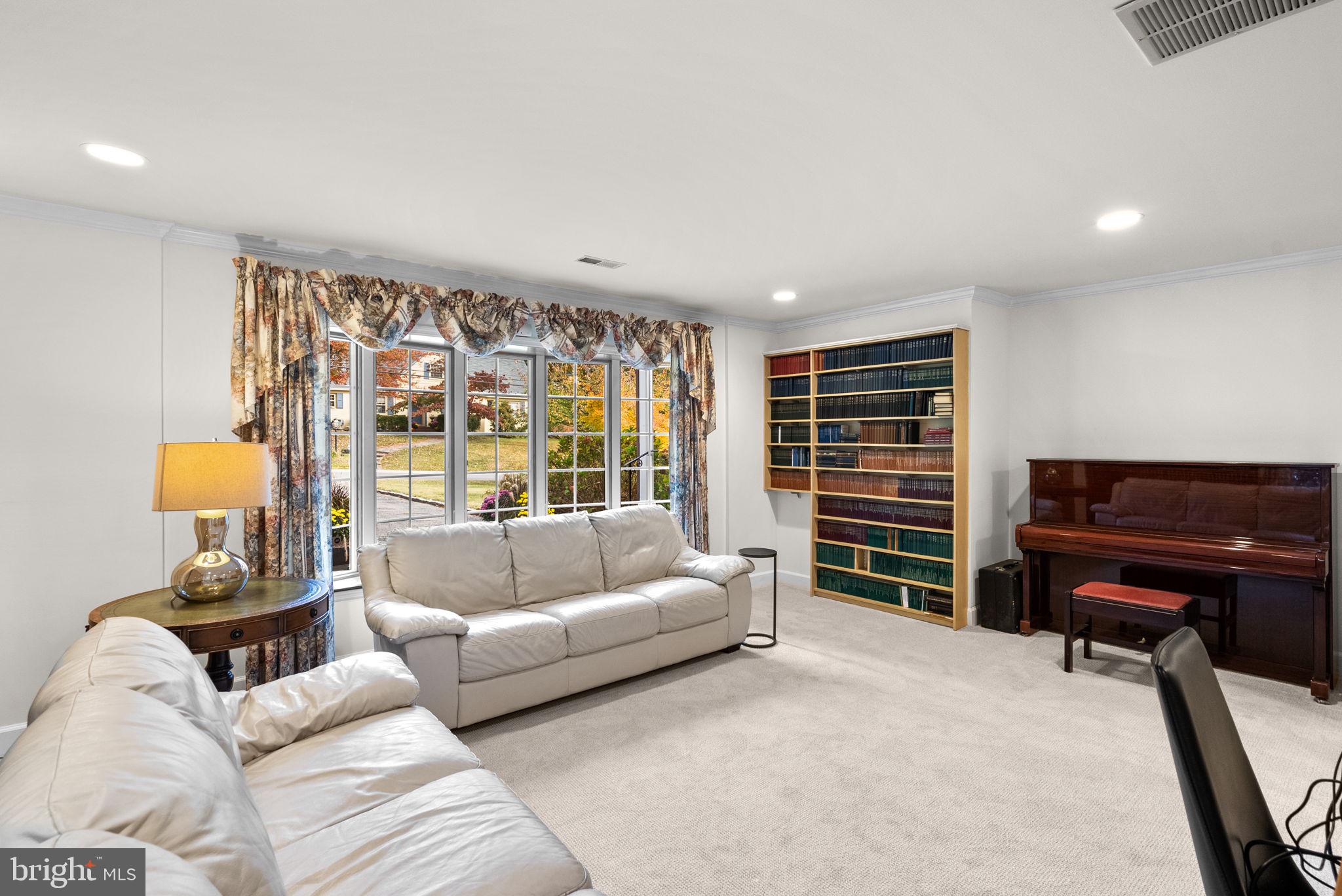 4111 Clagett Road Hyattsville, MD 20782 - Photo 41 of 61 a living room with furniture and a piano