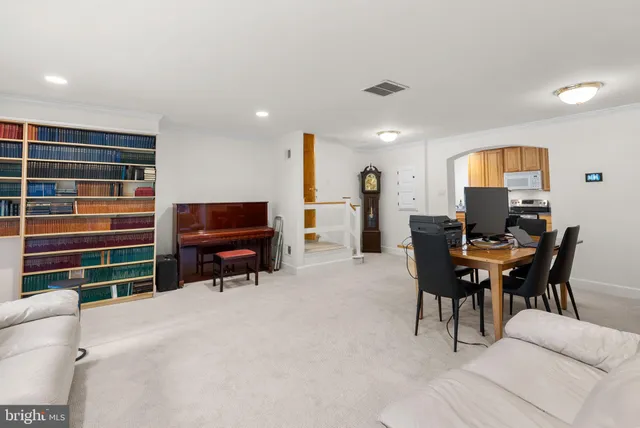 a bedroom with a bed and a view of bedroom