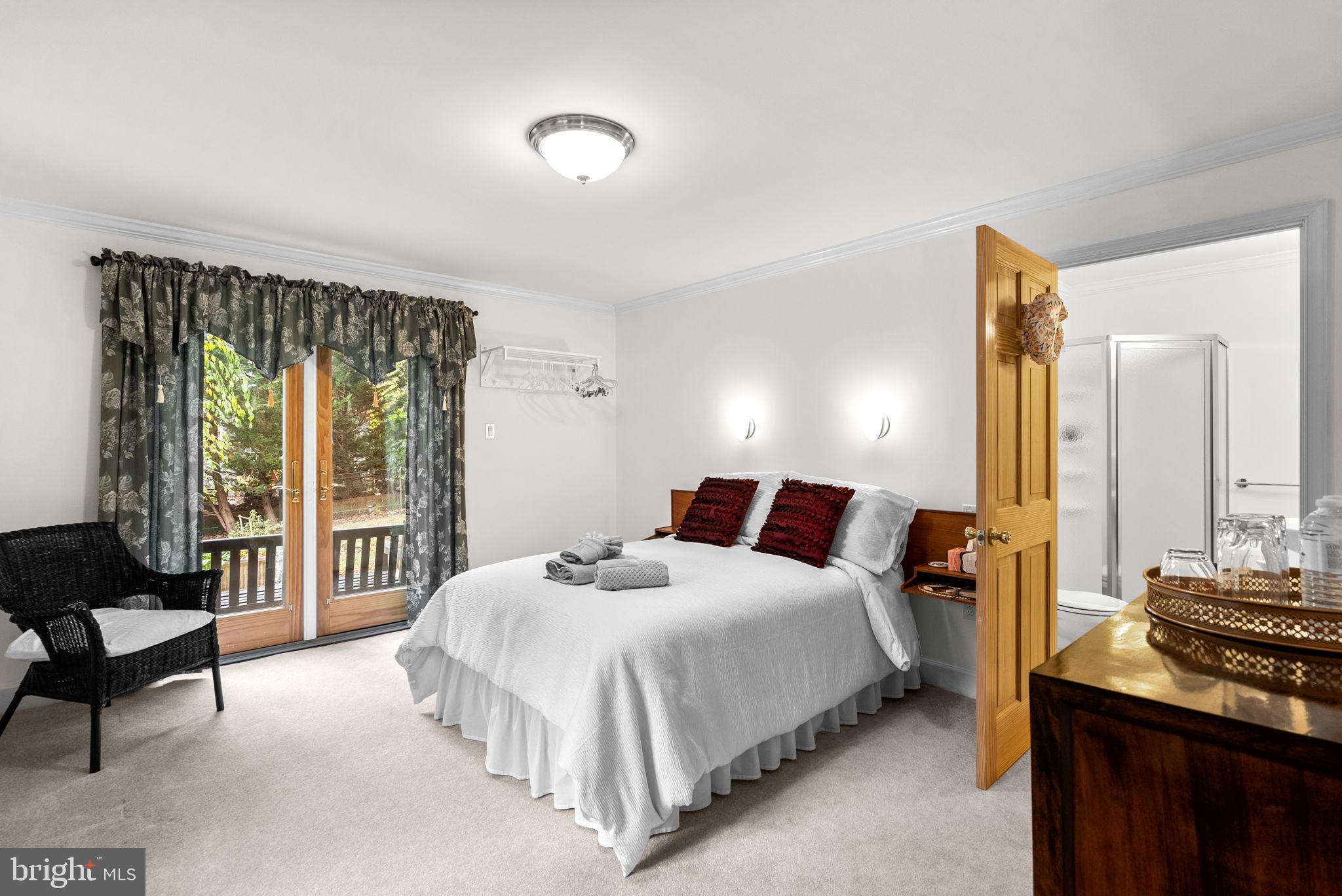 4111 Clagett Road Hyattsville, MD 20782 - Photo 49 of 61 a bedroom with a bed and a night stand