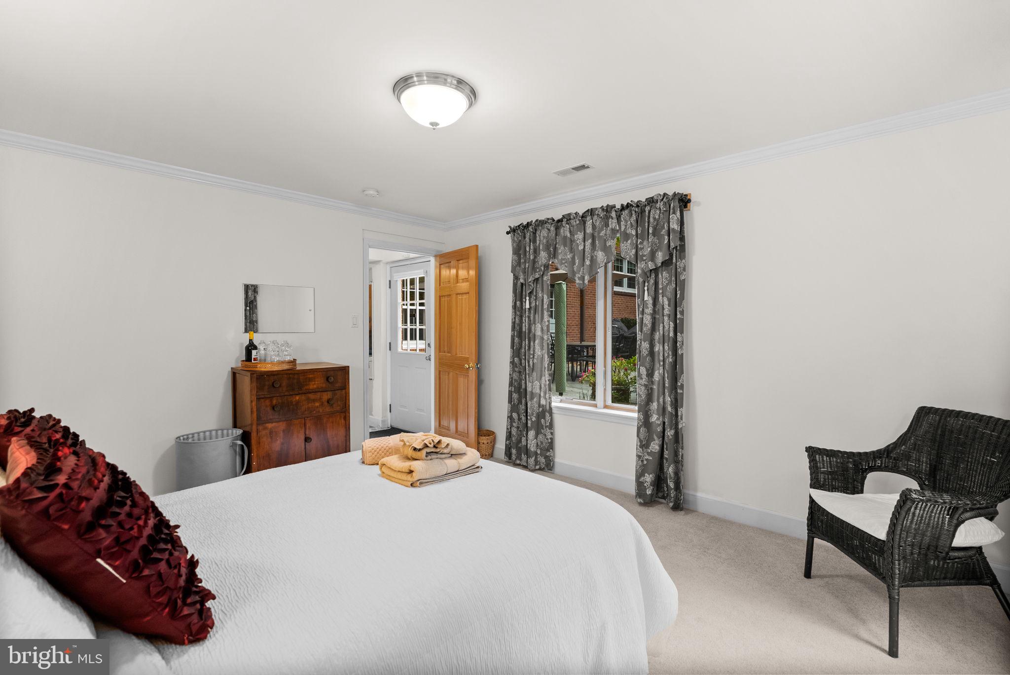 4111 Clagett Road Hyattsville, MD 20782 - Photo 50 of 61 a bedroom with a bed and a window