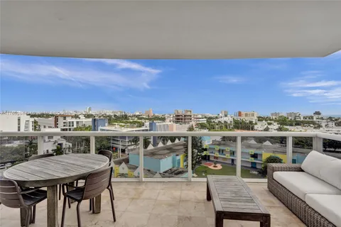 a view of a terrace with furniture