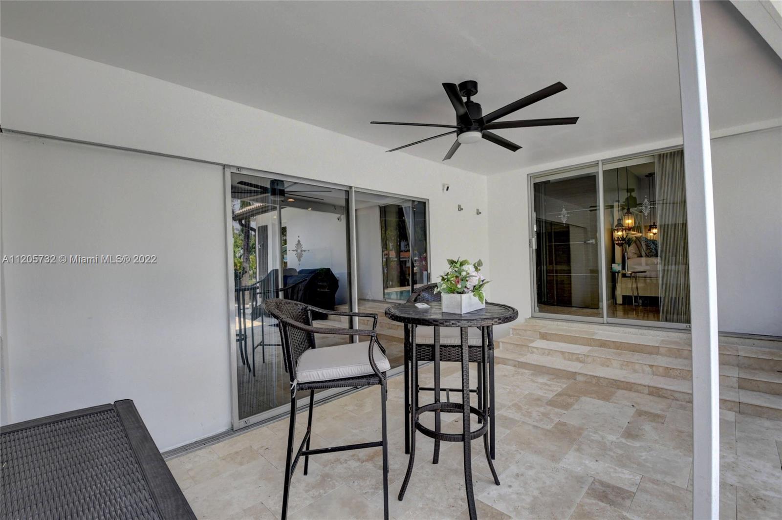 1291 Southwest 4th Court Boca Raton, FL 33432 - Photo 29 of 54 a dining room with furniture and window