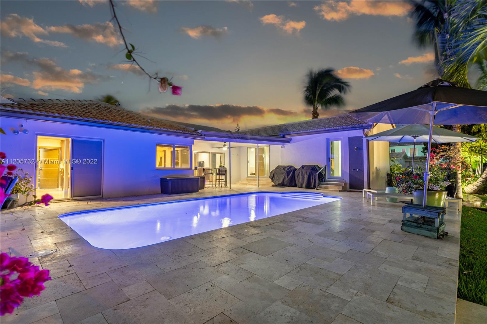 1291 Southwest 4th Court Boca Raton, FL 33432 - Photo 47 of 54 a swimming pool with outdoor seating