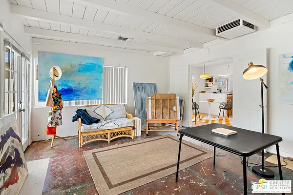 a bedroom with furniture and a bed
